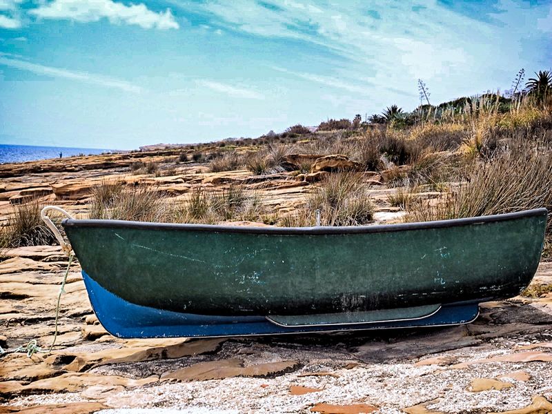 Boat by the sea