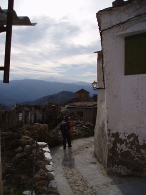 Passing a ruined house