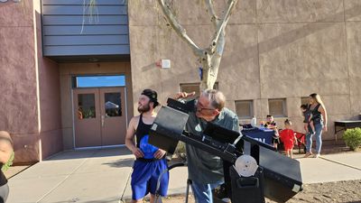 Grant Klassen with Dobsonian telescope