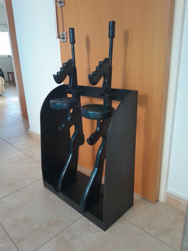 tommy guns in storage rack