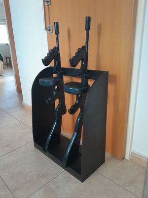 tommy guns in rack