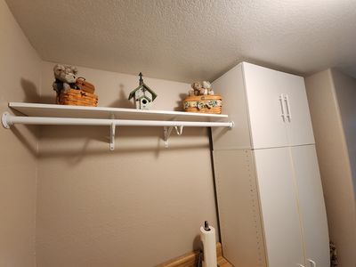 Added top cabinet and redid clothes rod and shelf.jpg