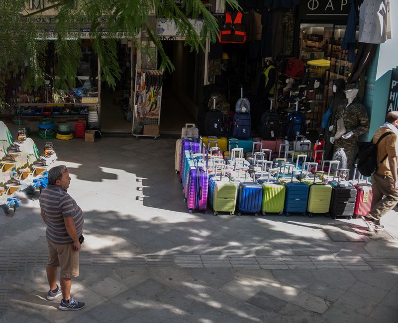 SUITCASE MERCHANT: HAVE SUITCASE, WILL TRAVEL
