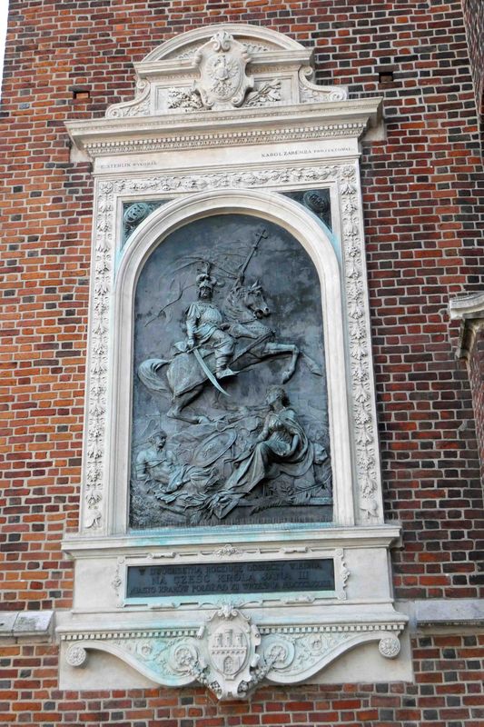 Plaque on St. Marys Basilica depicts King Jan III Sobieski (reigned 1674-96)
