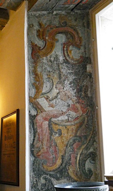 Mural believed to be part of the original 1422 Town Hall Pharmacy building