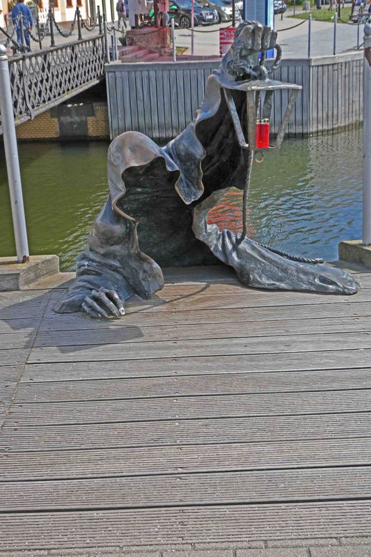 The Black Ghost statue near the pedestrian bridge in Klaipeda, Lithuania