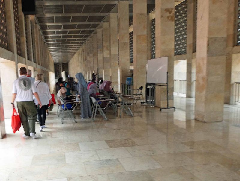 Classes are held in Istiqlal Mosque to teach women to read the Koran