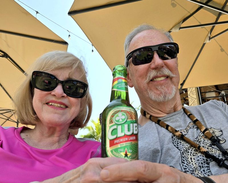 Having a local beer at the Raybo Hotel in Takoradi, Ghana.jpg