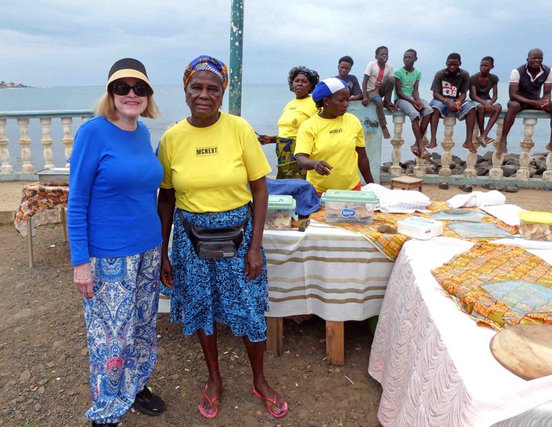 After tasting grilled fish, roasted breadfruit, and plantain chips in Pantufo, Sao Tome.JPG