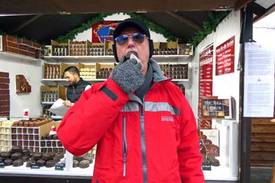 Bill eating an Irish Cream Schaumkuss (Foam Kiss) at Charlottenburg Palace Christmas Market