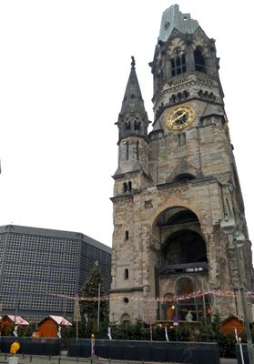 Kaiser Wilhelm Memorial Church was badly damaged by bombing in 1943, but left unrestored as a memorial