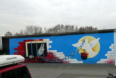 The East Side Gallery is 1.3 km of the Berlin Wall that is devoted to famous street art that was on the Berlin Wall
