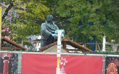 Statue of Martin Luther in the Christmas Market at Alexanderplatz in Berlin