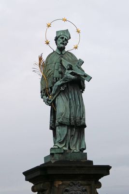The statue of John of Nepomuk (1683) on Charles Bridge in Prague
