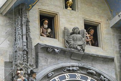 St. John & St. Phllip are 2 of the 12 apostles that rotate through the windows every hour on the hour