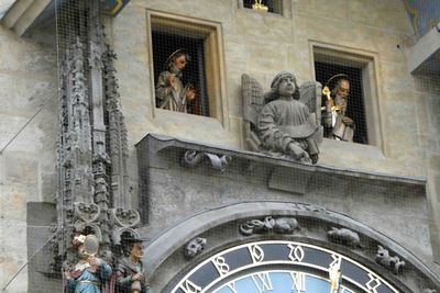 St. Thomas & St. Paul in the windows of Prague's Astronomical Clock