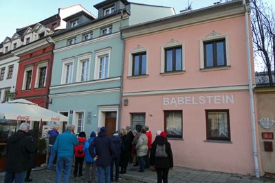 The green house is the childhood home of Helena Rubenstein (founder of Helena Rubenstein Cosmetics)