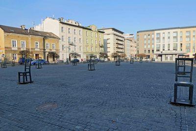 In Krakow Heroes Square each of 33 chairs represents 1,000 Krakow lives taken by Nazi Germany