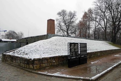 Bunker and chimney of gas chamber and crematorium at Auschwitz
