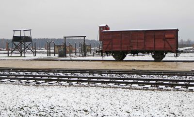 Actual rail car sits at siding where prisoners were off-loaded in Birkenau
