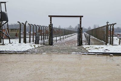 Upon arrival in Birkenau by rail, prisoners entered through this gate