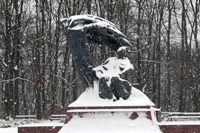 Hard to recognize the Frederic Chopin Monument in the snow in Warsaw