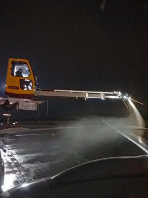 Plane de-icing in Warsaw before takeoff to return home