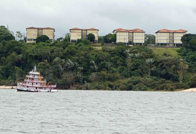 Tugboat on Rio Negro below the Amazon Headquarters of the  Brazilian Navy