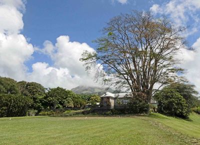 DePaz Castle with Mount Pelee (active volcano) in the background