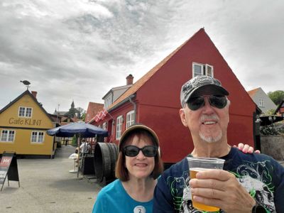 Trying the local beer in the fishing village of Gudhjem, Denmark