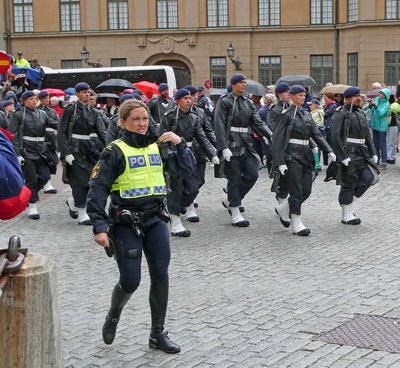 Changing of the guard at Stockholm Royal Palace in the rain