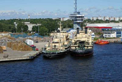 Icebreaker 'VARMA' and Tug 'FOROS' docked on the Daugava River in Riga, Latvia