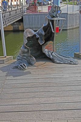 The 'Black Ghost' statue near the pedestrian bridge in Klaipeda, Lithuania