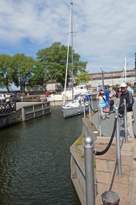 Boats passing through the opening created by the 'rotating bridge' in Klaipeda