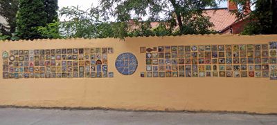 Wall of tiles created by school kids with representations of Klaipeda