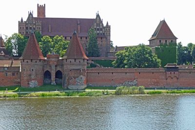 Malbork Castle's Bridge Gate is on the Nogat River in Poland