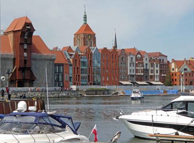 Crane gate (14th Century) and other buildings along Motlawa River in Gdansk, Poland