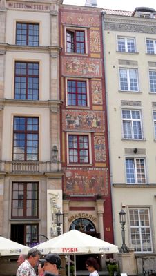Narrow, painted building on the 'Royal Route' in Gdansk, Poland