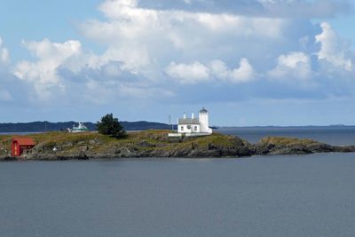 Sorhaugoy Lighthouse on the island Tonjer at the harbor entrance of Haugesund, Norway