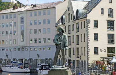 Skarungen fisher boy statue in Alesund, Norway is dedicated to the fishing industry