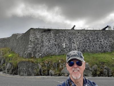 Where Bill is standing outside Fort Charlotte would have been water when the fort was built