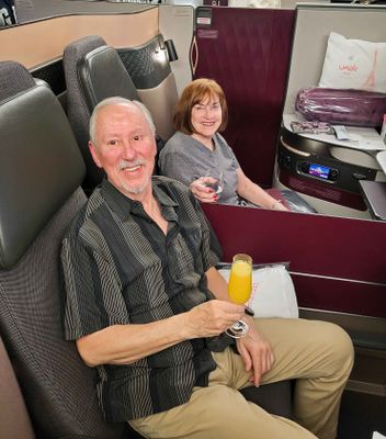 Adjoining Q-suites on the way to Doha, Qatar