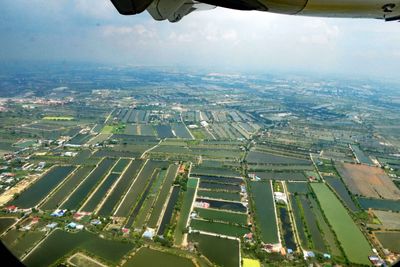Flying over rice patties in Thailand