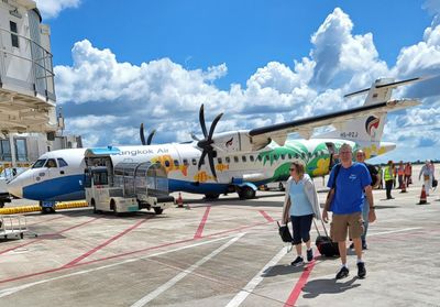 Our traveling companions (Susan & Kevin) on the tarmac in Siem Reap, Cambodia