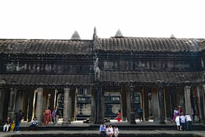 Families visiting Angkor Wat on a Sunday in Cambodia