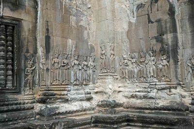 16 Aspara on the corner of an outer tower at Angkor Wat