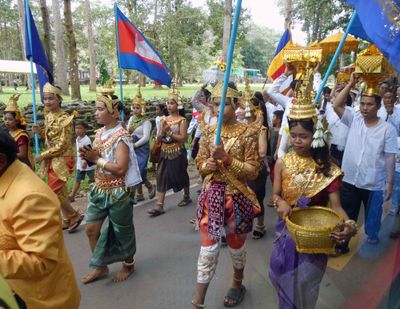 Traditional costumes on pilgrimage inside the confines of Angkor Thom