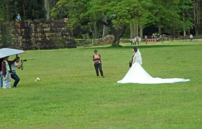 Wedding photo shoot in front of the 'Terrace of the Leper King' at Bayon Temple