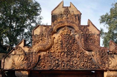 Intricate carvings on the gate of Banteay Srei are over 1200 years old