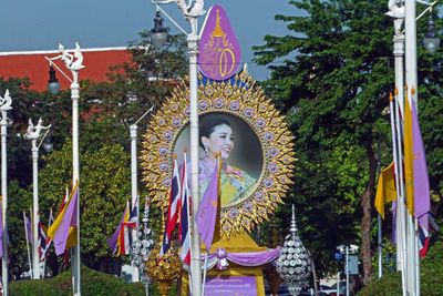 Photos of Queen Suthida of Thailand (she's now 45) of Thailand are also found throughout Bangkok